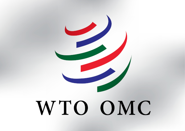 Logo da OMC (WTO, em inglês).