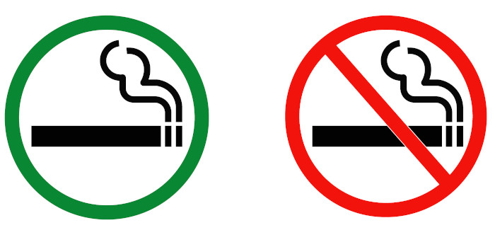 Placas sinalizando quando é permitido ou não é permitido fumar.
