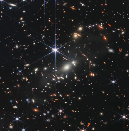 Imagem capturada pelo Telescópio Espacial James Webb mostrando galáxias distantes a milhões de anos-luz.