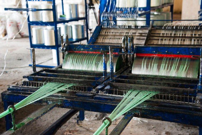 Processo de fabricação de fios de fibra de vidro para aplicação na construção civil.
