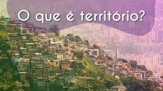 Escrito"O que é território?" sobre imagem mostrando o contraste de uma favela com os prédios da cidade.