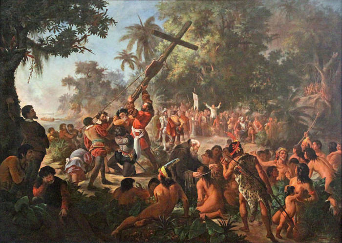 Pintura retratando o erguimento de uma cruz em Porto Seguro, fato que se deu dias após a chegada dos portugueses ao Brasil.